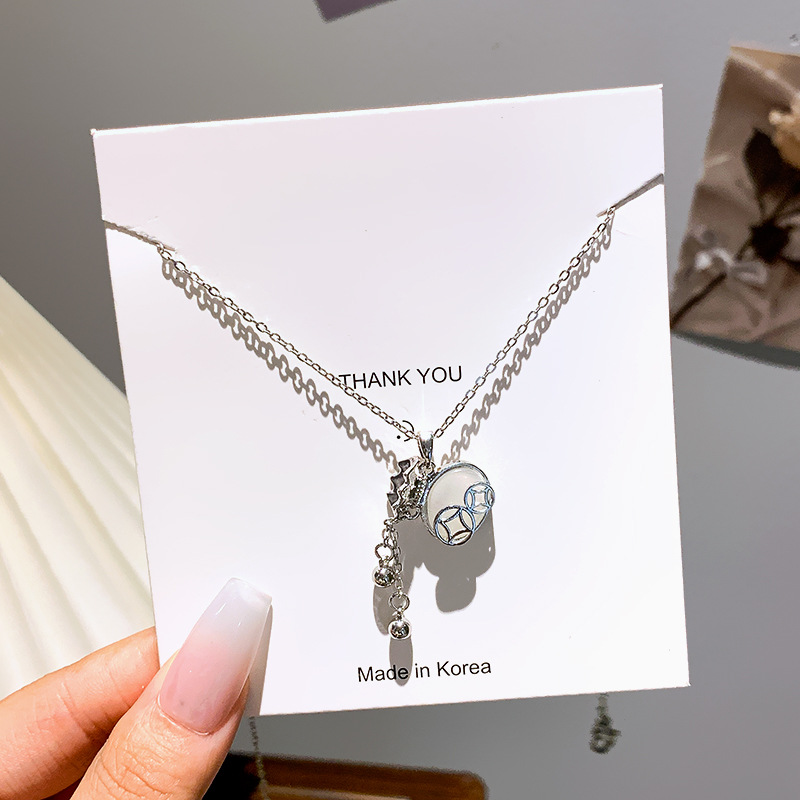 Silver cat's eye tassel money bag necklace, women's niche style, versatile collarbone chain, internet-famous light luxury style accessory wholesale Specification drawing