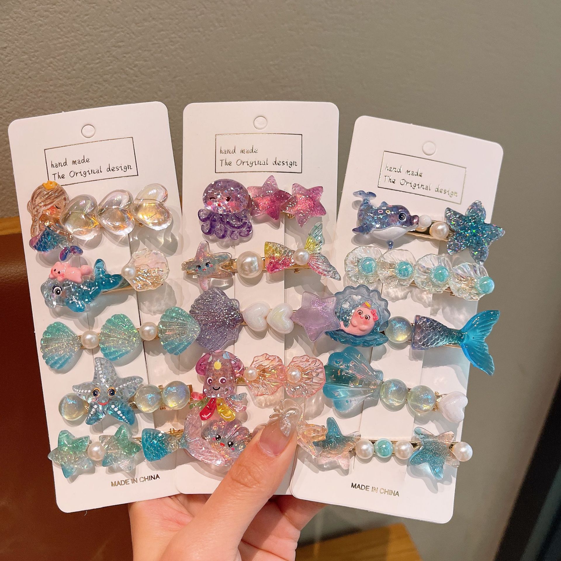 The new children's cute ocean series hair clips, cartoon mermaid, shell and starfish hair accessories will not damage the sides of the baby's hair full figure