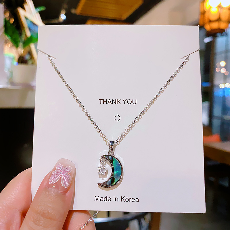 Abalone shell surface star moon pendant titanium steel necklace, a unique and elegant luxury collarbone chain for women, a versatile accessory for Internet celebrities Application Scenario