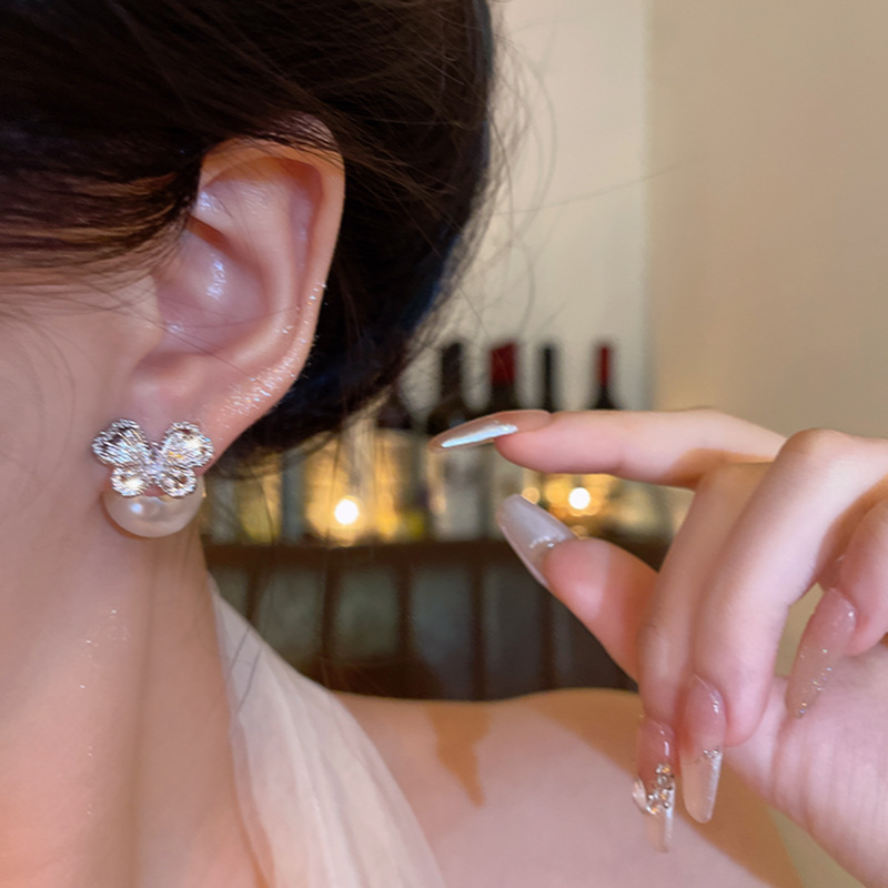 Silver exquisite hollowed-out butterfly stud earrings for women, light luxury, versatile and elegant, two-wear pearl earrings, high-end earrings Application Scenario