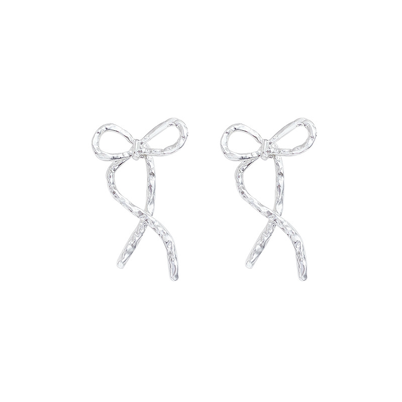 Korean style simple and high-end bow earrings, versatile for women, design sense, niche tassel stud earrings, wholesale of internet-famous earrings Item Picture