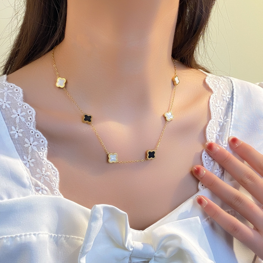 This Japanese and Korean fashion double-sided six-leaf clover titanium steel necklace is simple, versatile and won't fade. It's a popular collarbone chain necklace Application Scenario