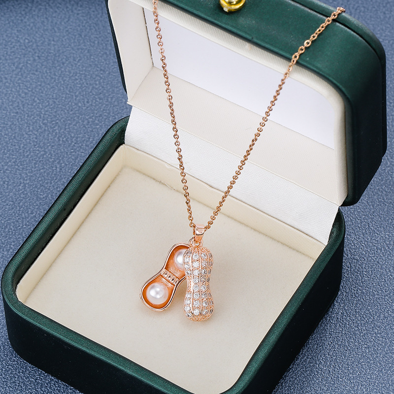 Korean 18k rose gold diamond-encrusted pearl peanut pendant necklace, a trendy and versatile women's Instagram style, a luxurious titanium steel necklace full of diamonds details Picture