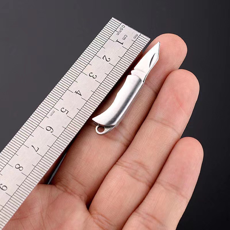 Mini brass folding knife, sharp and exquisite small knife, portable keychain, pendant, pocket knife, self-defense, unpacking packages undefined