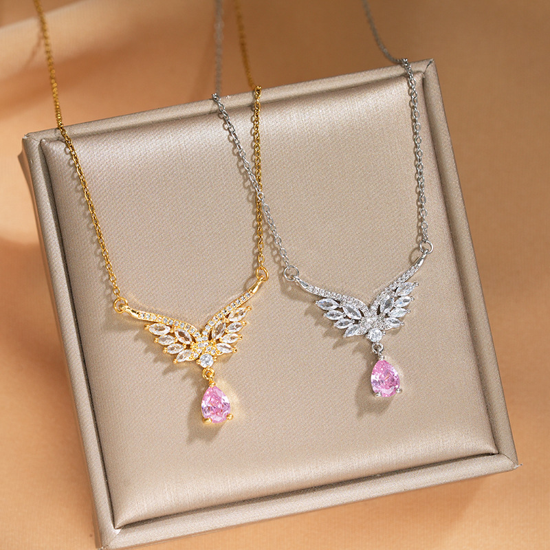Cross-border light luxury best-selling pink water drop butterfly wing large zircon pendant titanium steel necklace, high-end women's collarbone chain full figure