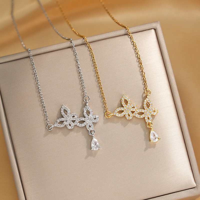 Korean style double butterfly titanium steel necklace for women, zircon water drop tassel pendant, fashionable and light luxury accessory wholesale full figure