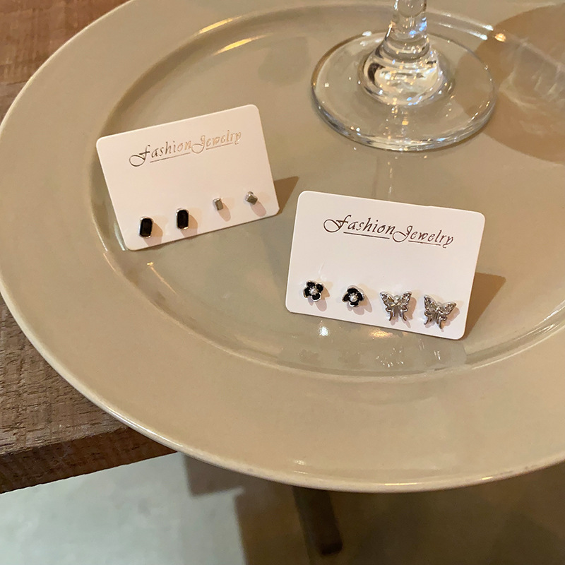 Diamond-encrusted, hollowed-out butterfly set stud earrings, mini, exquisite square black earrings for women, with a unique, high-end and elegant style Application Scenario