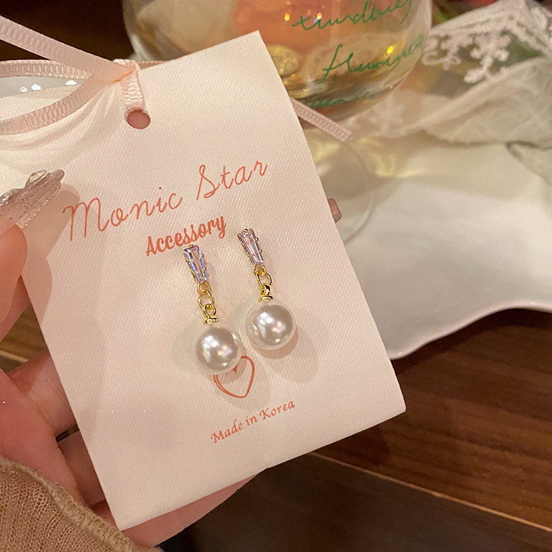S925 Silver Needle Exquisite Zircon tassel pearl stud earrings are versatile for women, exuding a sense of high-end luxury and a light luxury style. Wholesale of best-selling earrings details Picture