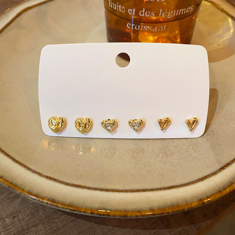 Liquid metal heart-shaped three-piece set of ear stud earrings, versatile for women, irregular and unique design sense, light luxury earrings Specification drawing