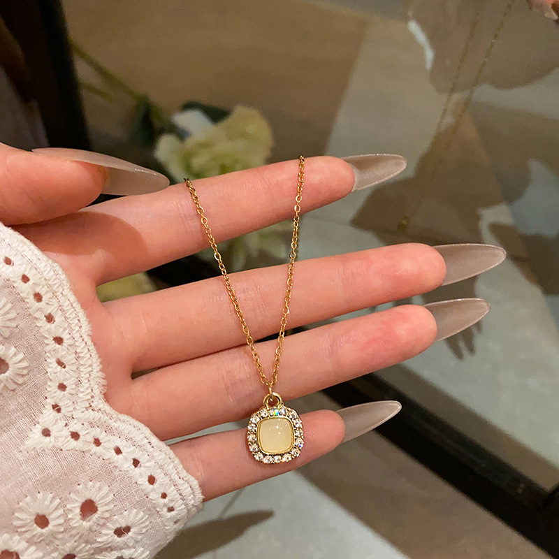 Light luxury cat's eye stone square pendant titanium steel necklace, high-end diamond-encrusted collarbone chain, elegant internet-famous sweater chain accessory details Picture