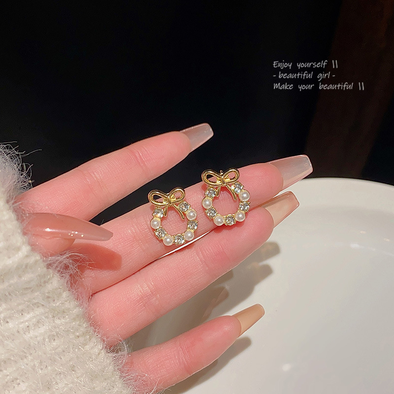 Light luxury and high-end bow earrings for women, simple Korean style pearl stud earrings, diamond-encrusted zircon versatile earrings wholesale Specification drawing