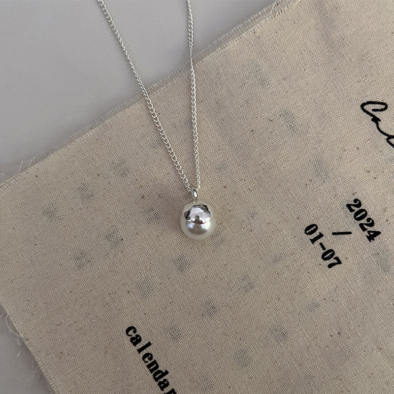 2024 New silver metal round ball snake bone chain round ball pendant necklace, simple sweater chain necklace details Picture