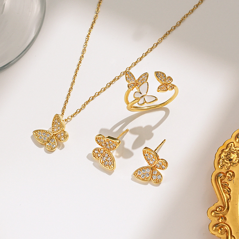 Fashionable little butterfly three-piece titanium steel necklace for women, light luxury and versatile, with zircon stud earrings and a high-end accessory full figure