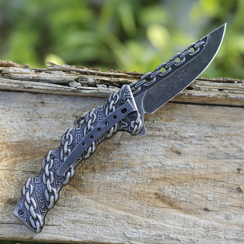 Embossed steel handle folding knife, stainless steel outdoor knife, wilderness survival tactical knife, mountain climbing portable camping knife Application Scenario