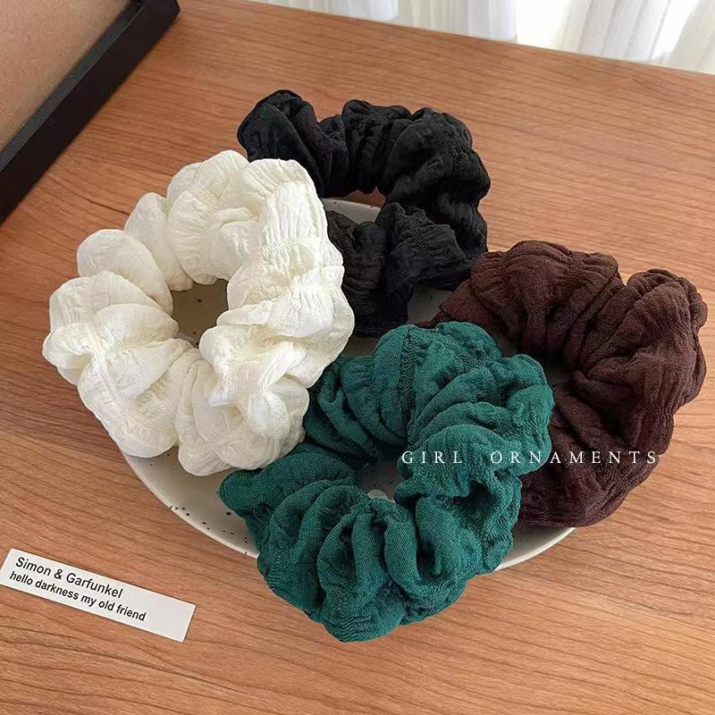 The cream puff hair band is simple and elegant, the pleated large intestine circle is high-end, the loose bun hair band is retro and the hair tie is stylish details Picture