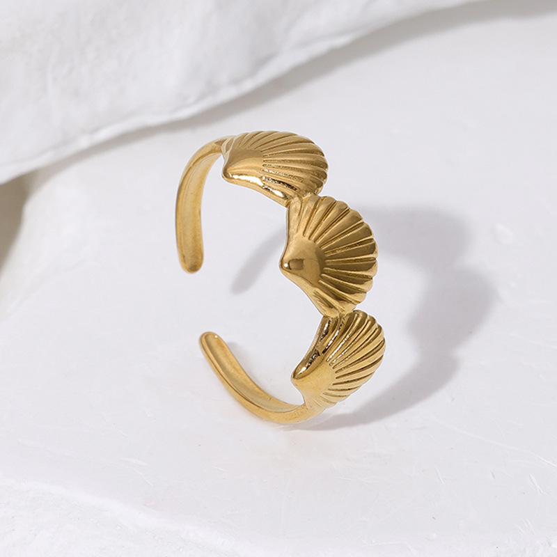This is a unique 18k gold electroplated and adjustable stainless steel ring with a cross-border fashion ocean style from Europe and America details Picture