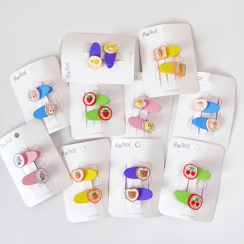 Korean cute cartoon children's hairpin headwear. A little girl's bangs and broken hair with flower and fruit clips on the side full figure