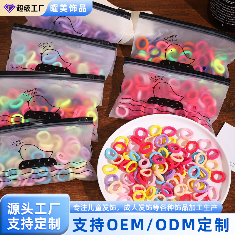 The small hair band for children is a simple, high-elasticity, seamless towel band used for tying babies' hair. It doesn't hurt the hair full figure