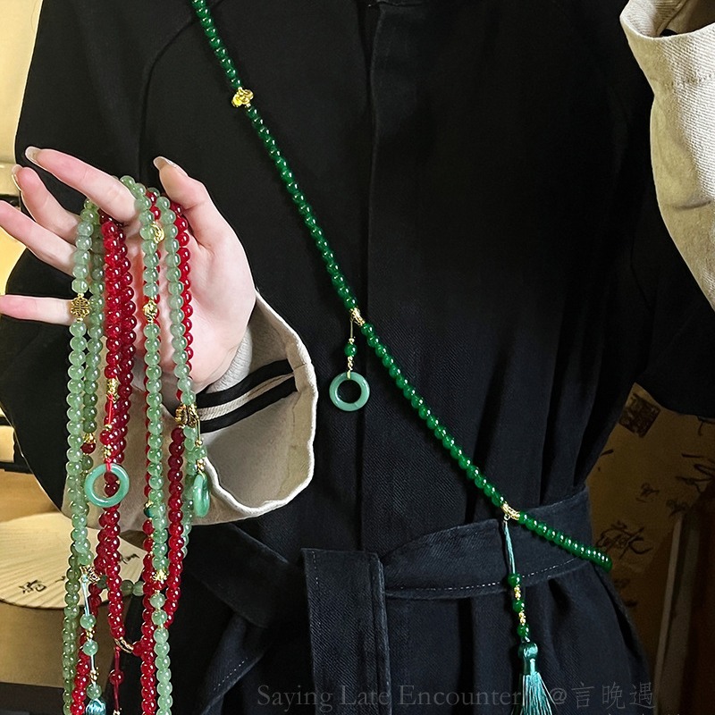 A 108-piece green beaded tassel necklace with a new Chinese style, a long crossbody chain sweater chain accessory full figure