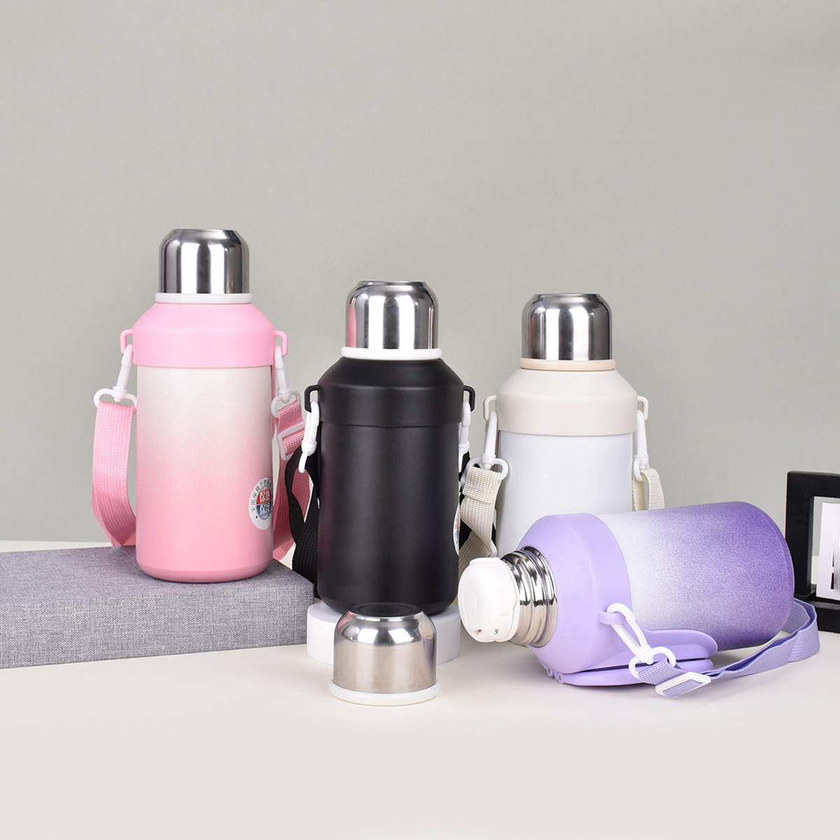 Wholesale of new 316 stainless steel insulated cups with high appearance standards, portable drawstring water cups, and outdoor large-capacity sports water bottles full figure