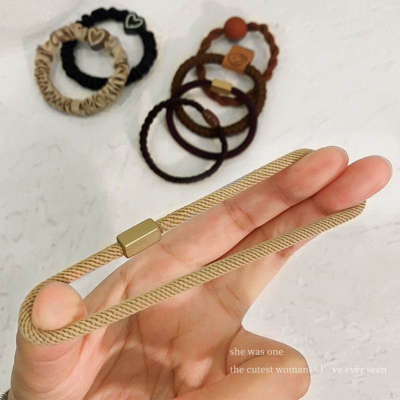 The rubber band women's hair tie is highly elastic, durable and does not hold hair. It is a new style of children's simple and elegant hair tie in 2023 Application Scenario