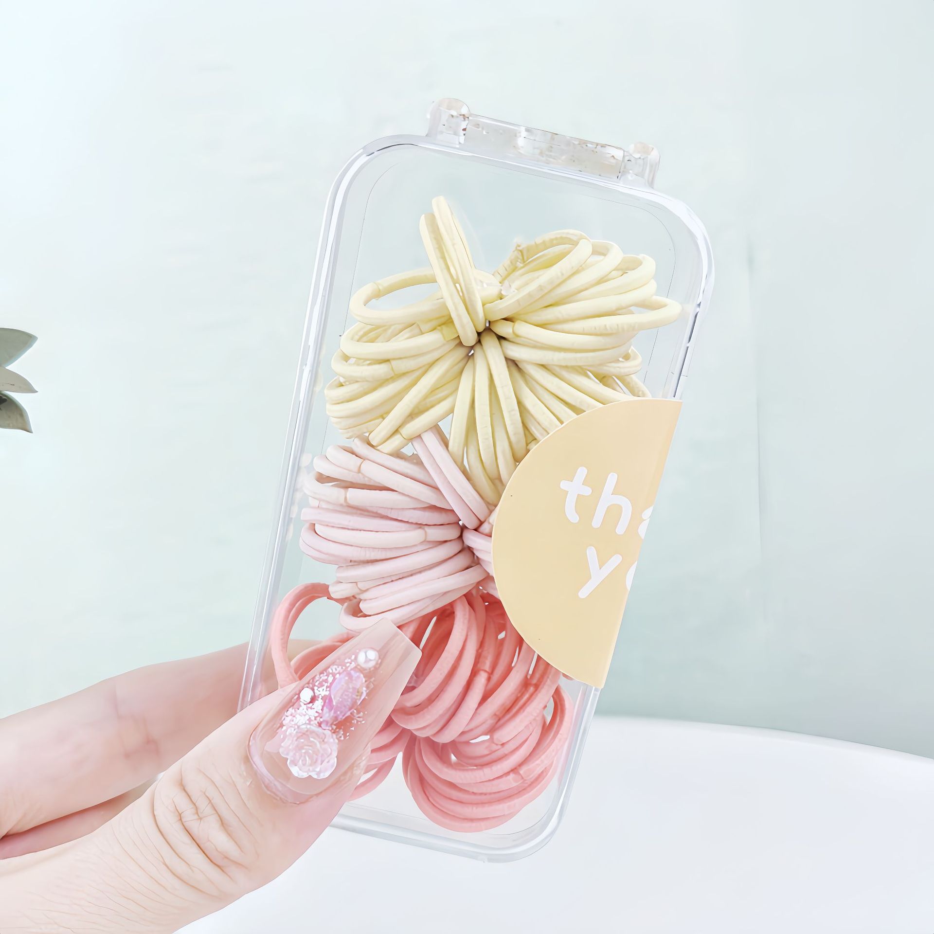 Children's colorful thumb hair bands, mini rubber bands, girls' and babies' hair-safe hair ties, kindergarten tie-up hair ties Application Scenario