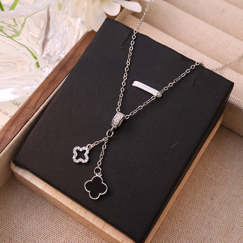 A versatile silver tassel double pendant four-leaf flower necklace for women, a niche, light luxury and exquisite collarbone chain accessory wholesale Specification drawing