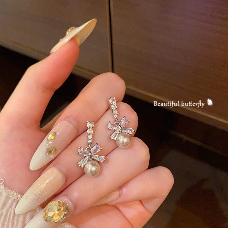 Super Flash Zircon bow Pearl earrings for Women 2025 New bestseller Stud earrings, niche design, high-end feel, trendy earrings full figure