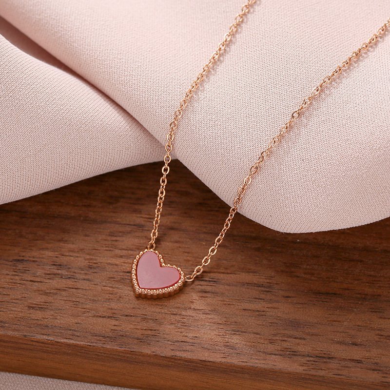 Korean version simple double-sided small red heart titanium steel necklace for women, 18k rose gold heart-shaped design pendant collarbone chain Application Scenario