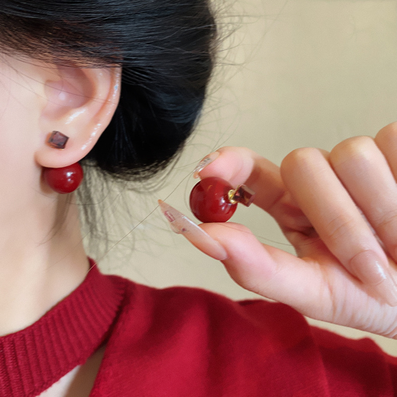 Ankela Red earrings with pearl stud earrings on both sides are a unique and light luxury item for women, exuding a high-end and retro charm details Picture