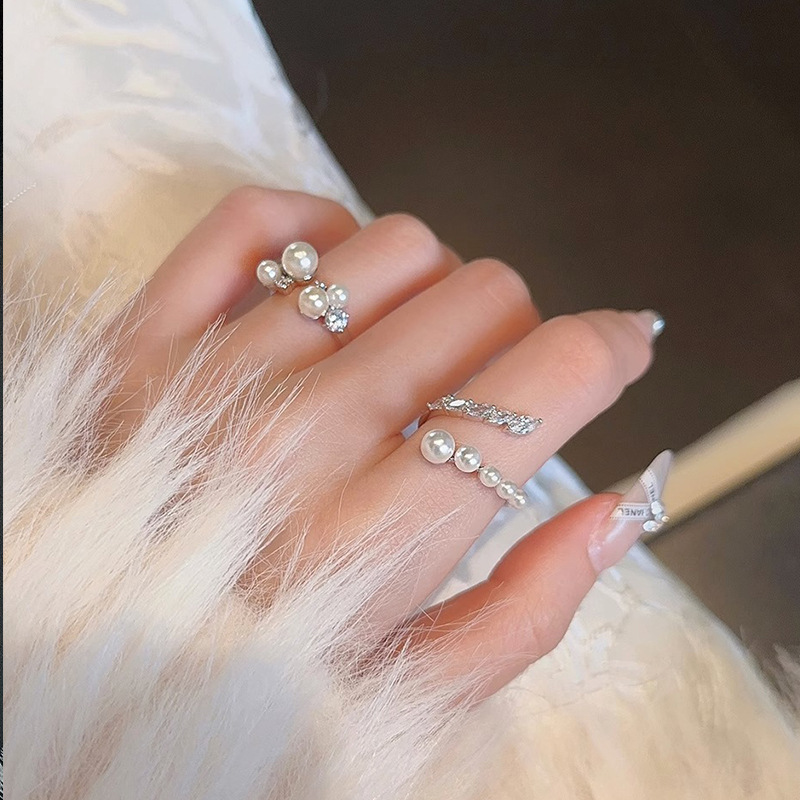 Pearl zircon open ring, a niche design for women, with an inS-style, elegant and luxurious style. It can be adjusted to the index finger level details Picture