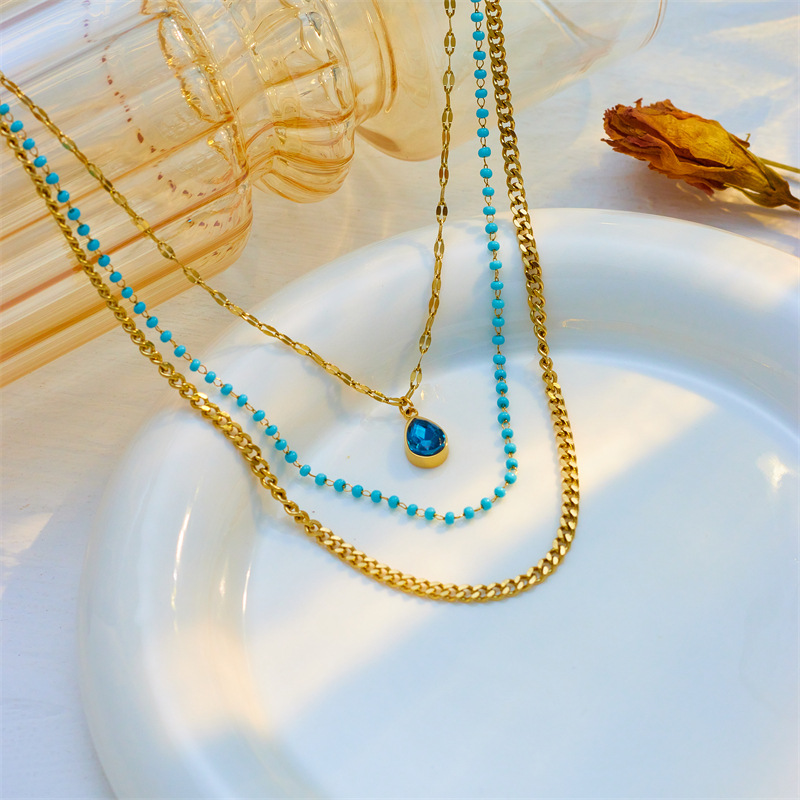A high-end retro titanium steel necklace with a multi-layer stacked chain water drop pendant and a unique European and American style details Picture