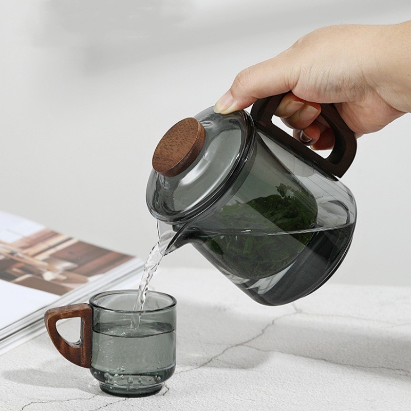 The Hehuan teapot, heat-resistant glass wood, complete set of teapot and tea ware, high borosilicate tea brewing and boiling utensils, tea and water separation flower teapot Application Scenario