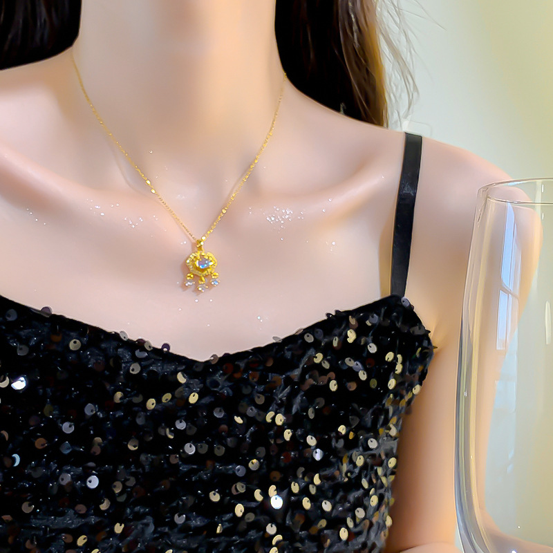 A simple and elegant Blue Spring gemstone peace lock titanium steel necklace, a women's three-tassel pendant, a new trendy collarbone chain accessory details Picture