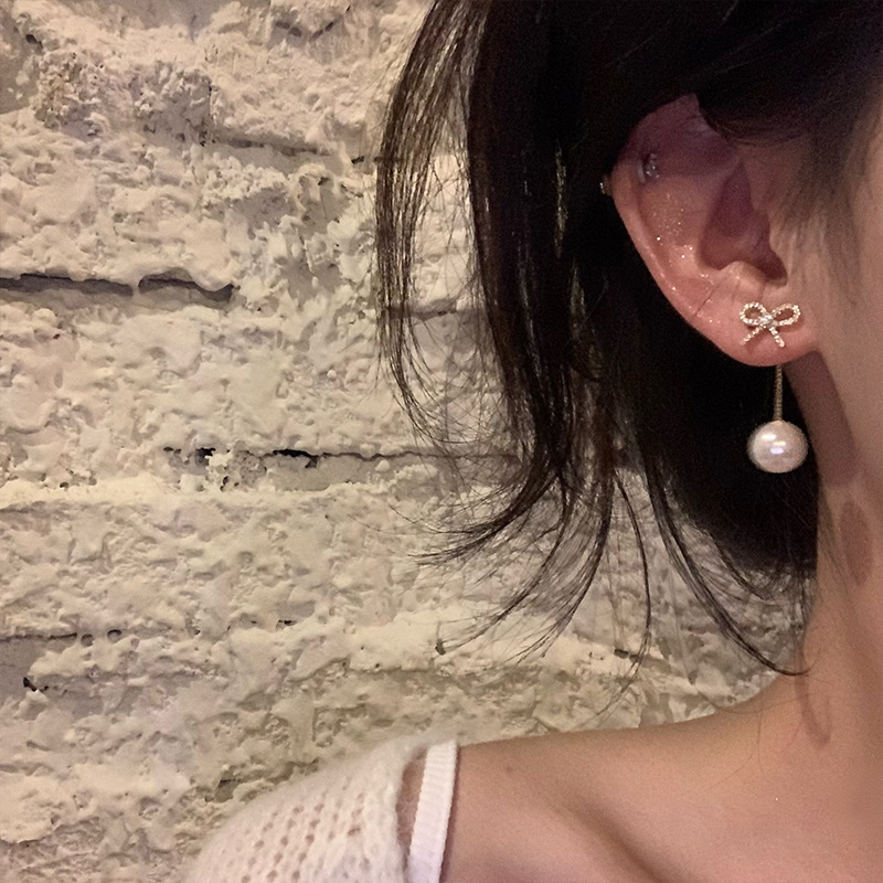 Autumn and winter collection of rear-hanging zirconium butterfly tassel earrings with a unique, light luxury and high-end look for women. Wholesale of pearl stud earrings Application Scenario