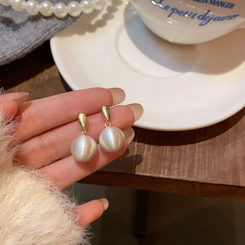 Frosted brushed metal round stud earrings for women, a light luxury and fashionable style with a high-end feel, new autumn and winter earrings for 2025 details Picture