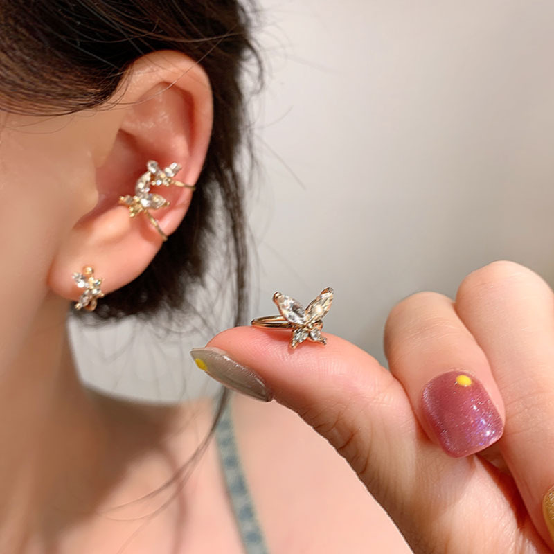 A must-have earring with sparkling diamonds and butterfly ear bone clips for women, exuding an ethereal and high-end charm. It's a new type of earrings from 2025 details Picture