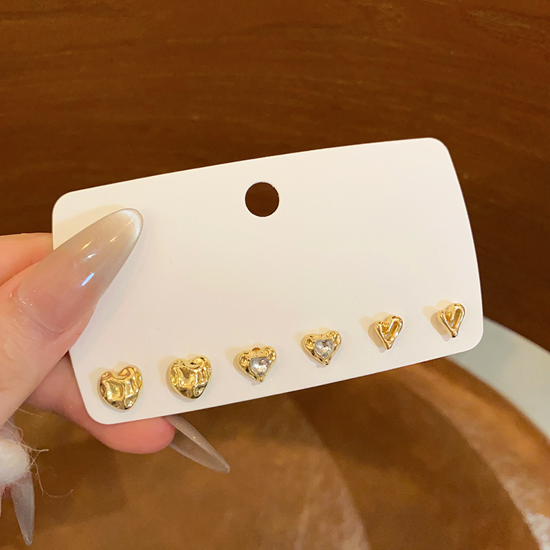 Liquid metal heart-shaped three-piece set of ear stud earrings, versatile for women, irregular and unique design sense, light luxury earrings full figure