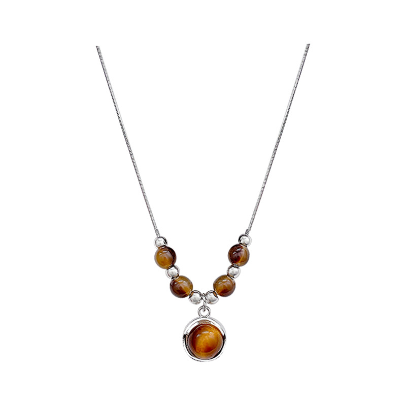 This autumn and winter vintage tiger's eye necklace is a versatile and elegant sweater chain with a high-end look. It's the same style as the popular collarbone chain necklace Item Picture