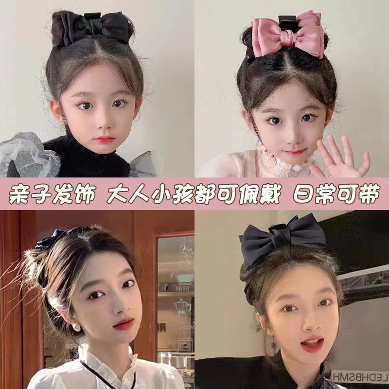 A black double-sided Korean-style large bow hair accessory with a hairpin on the back of a woman's head Specification drawing