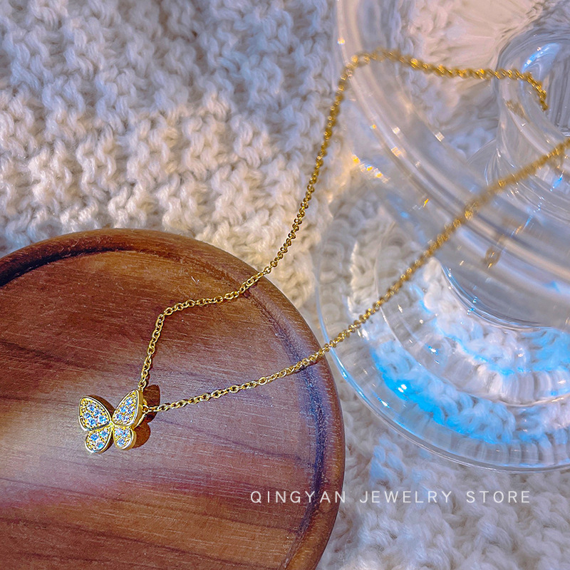 Korean-style light luxury silver butterfly pendant titanium steel necklace for women, simple and versatile, diamond-encrusted collarbone chain, high-end accessory details Picture