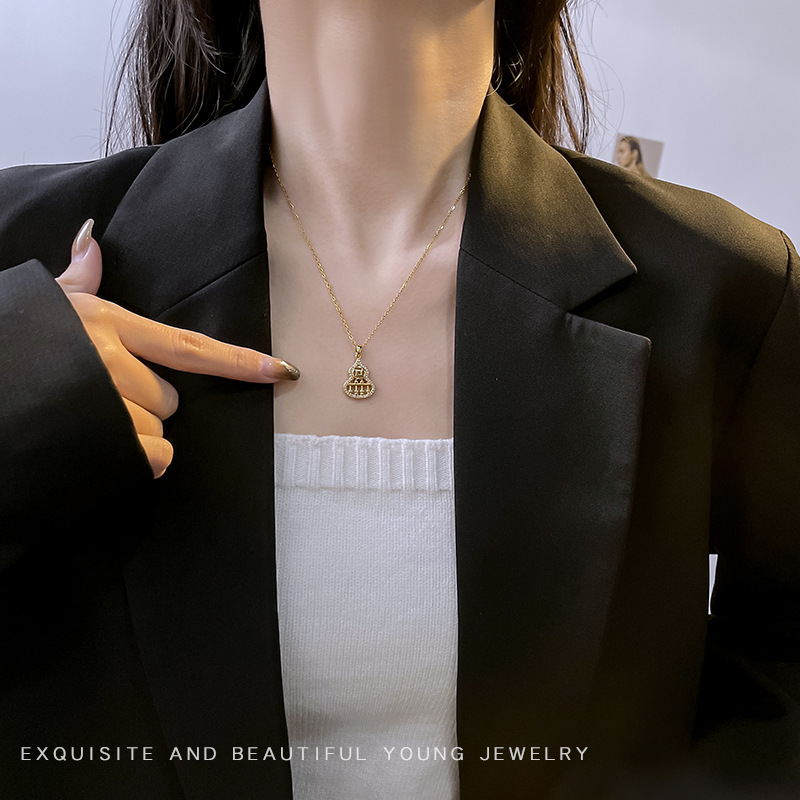 Hollowed-out small gourd abacus pendant titanium steel necklace for women, inS-style, niche and light luxury collarbone chain, personalized and versatile accessory Application Scenario