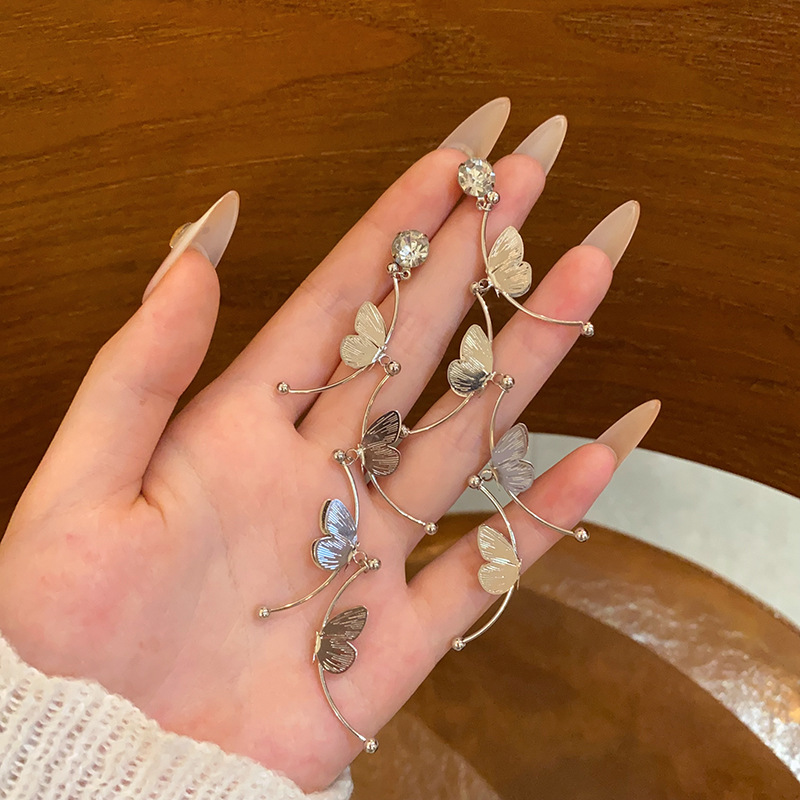 Cold style hollowed-out butterfly tassel stud earrings for women, a unique and high-end look, versatile and exquisite earrings, a light luxury and elegant ear accessory details Picture