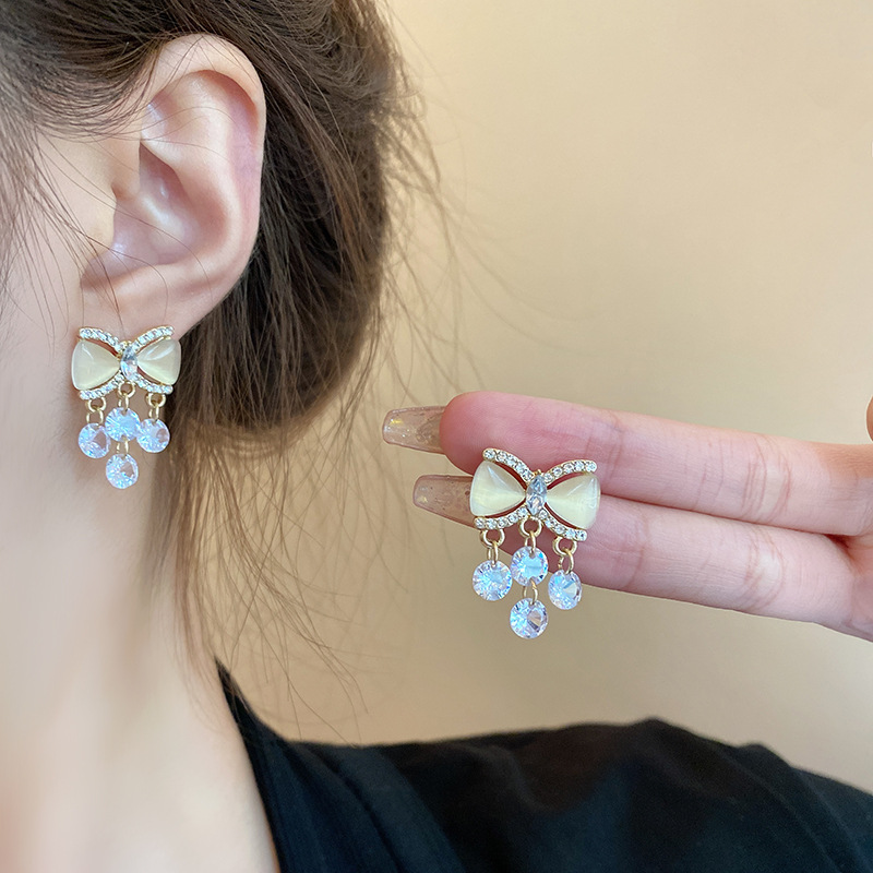 S925 silver needle exquisite micro-inlaid bow zircon earrings, high-end women's fringed stud earrings, versatile and elegant earrings Application Scenario
