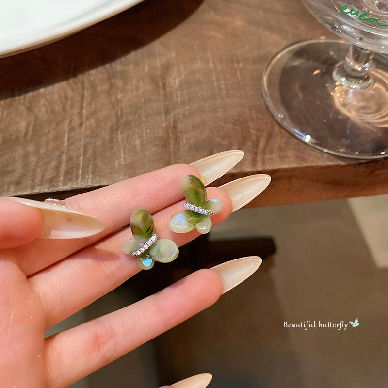 Forest-themed gradient green butterfly earrings for women, light luxury and versatile, micro-inlaid zircon stud earrings, high-end and elegant, trendy earrings full figure