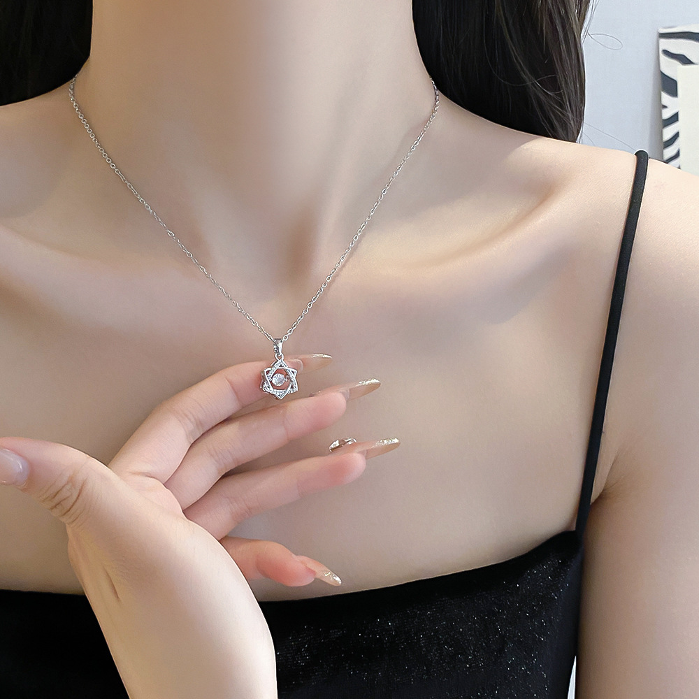 A silver full-diamond, dynamic hexagonal titanium steel necklace with a unique feminine charm and a light luxury design, a popular collarbone chain accessory Application Scenario