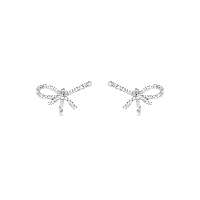 Slightly inlaid with zirconium super-sparkling irregular bow stud earrings, this round face earpiece exudes a cold and luxurious feminine charm with a high-end feel Item Picture