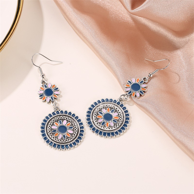 Ethnic-style colorful oil-dripping long small Daisy retro earrings, court-style carved alloy flower totem earrings details Picture