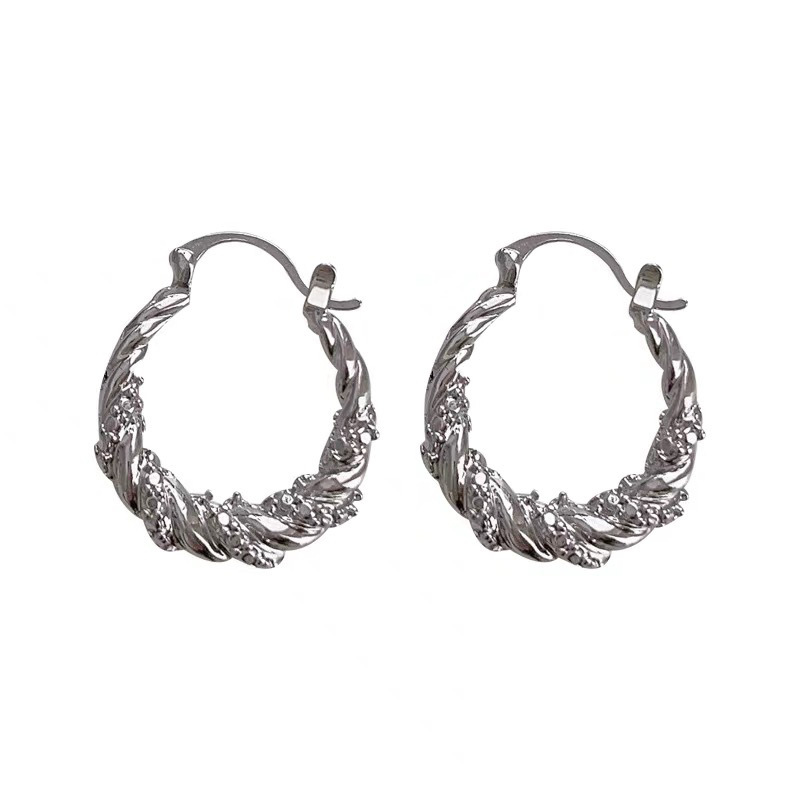High-end wrapped diamond ear buckles for women, light luxury, niche and unique personality ear studs, fashionable bestsellers, retro earrings wholesale Item Picture