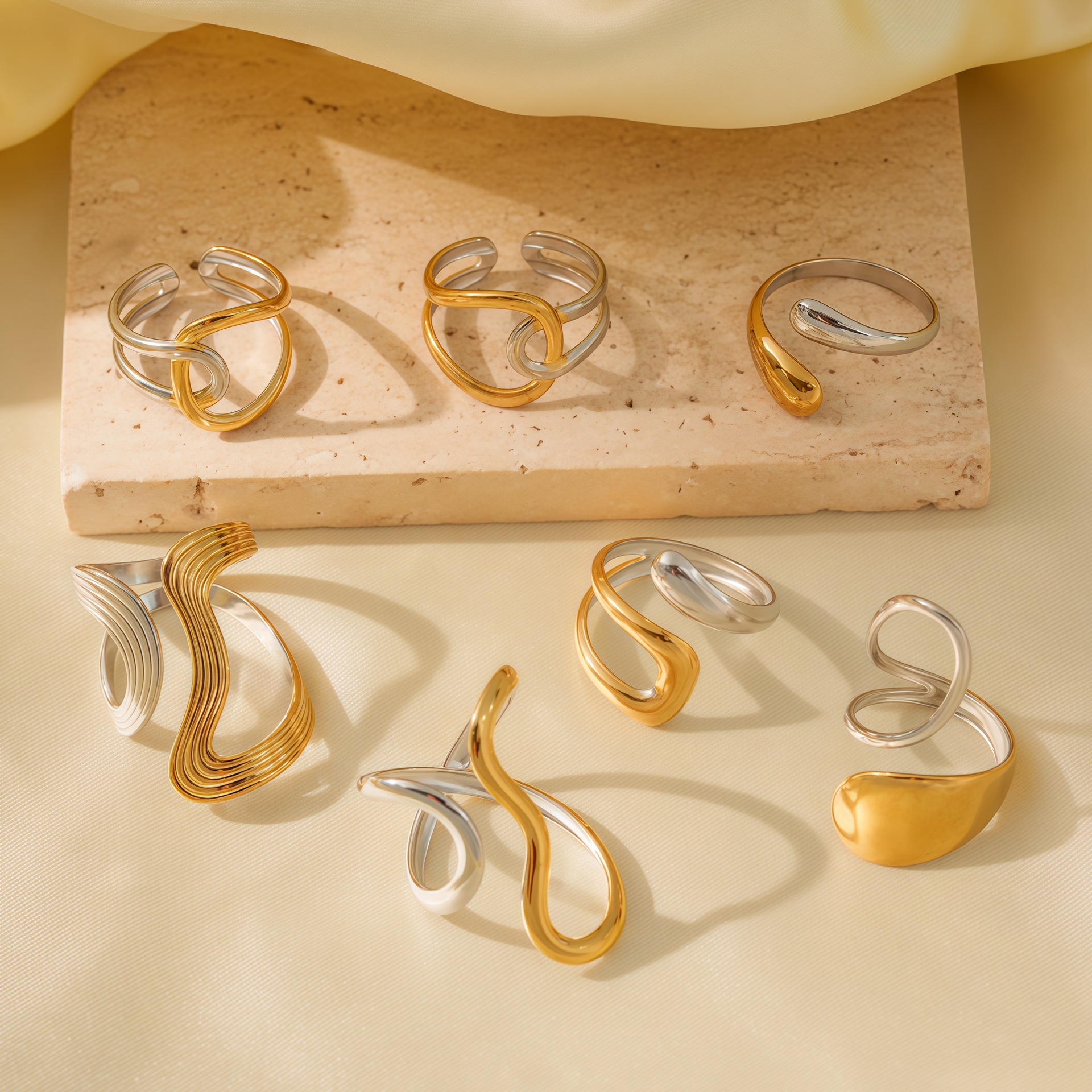 Wholesale of popular stainless steel jewelry with irregular geometric water drop lines and hollowed-out rings on Amazon in Europe and America full figure